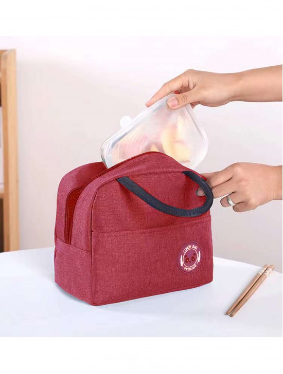 Solid Color Insulated Lunch Bag with Zip Closure and Outside Pocket.